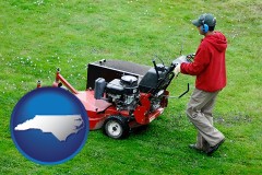 north-carolina map icon and a lawn mowing service