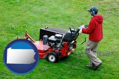 pennsylvania map icon and a lawn mowing service